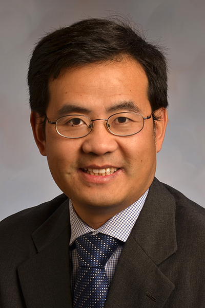 Portrait of author Anming Hu